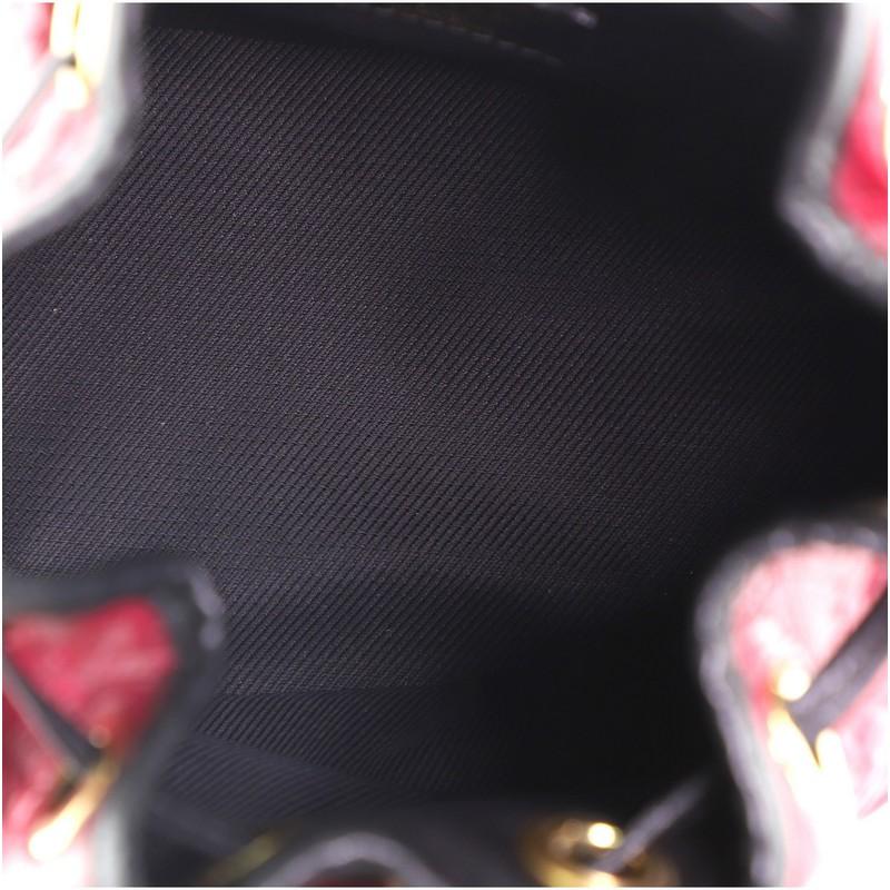 Louis Vuitton Double Jeu Neo Noe Tasche aus geprägtem Leder mit Monogramm 1