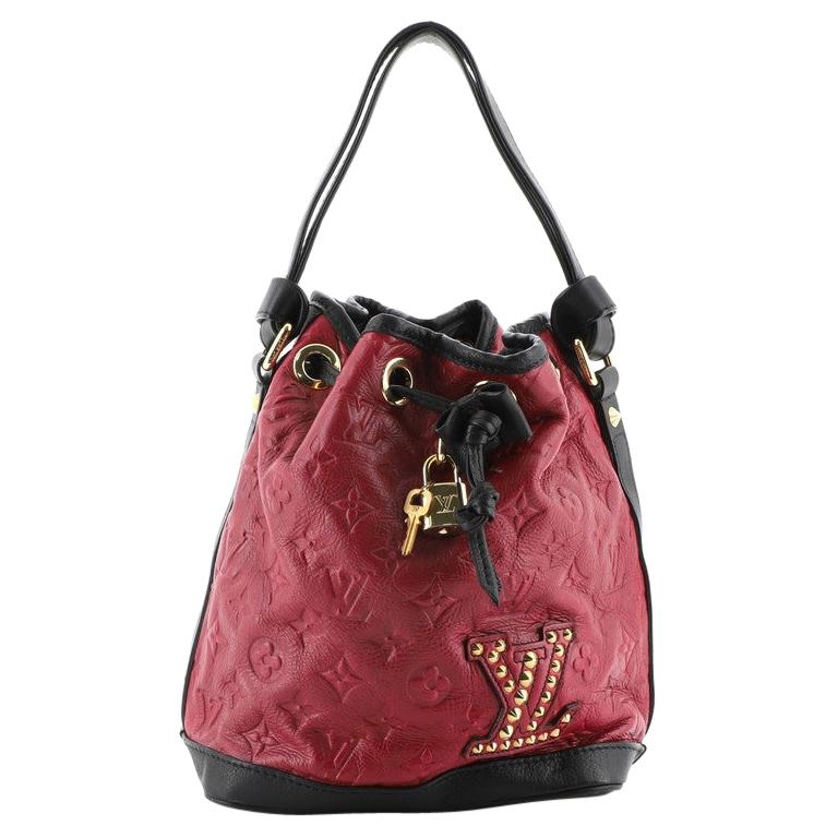 Louis Vuitton Double Jeu Neo Noe Bag Monogram Embossed Leather at 1stDibs
