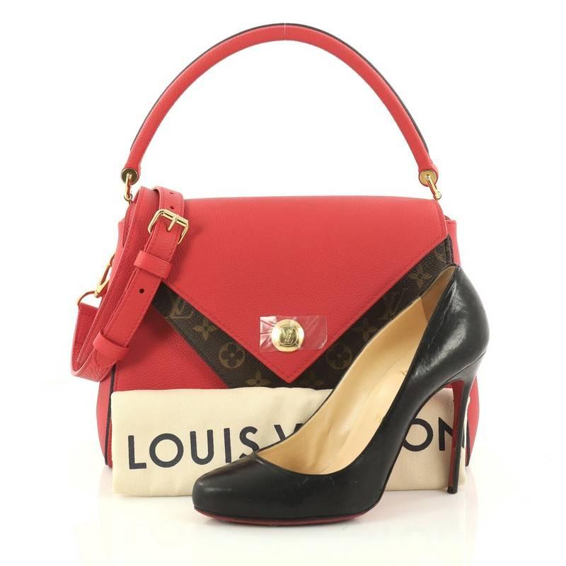 This authentic Louis Vuitton Double V Handbag Calfskin and Monogram Canvas is a trendy and elegant bag perfect for your daily excursions. Crafted in red calf leather and brown monogram coated canvas with two V flaps, this chic bag features a rolled