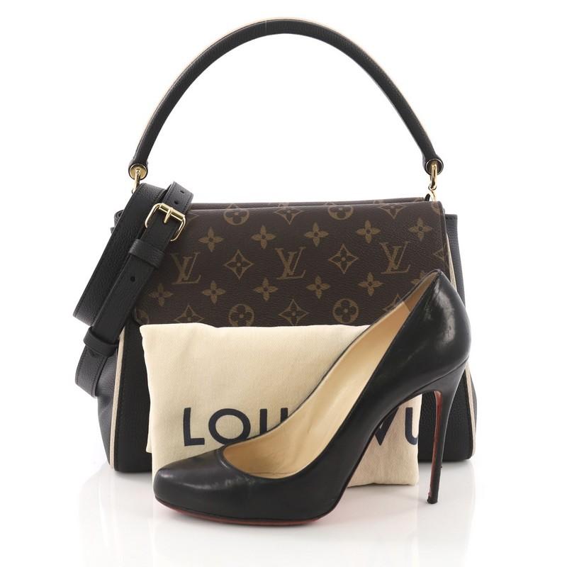 This Louis Vuitton Double V Handbag Calfskin and Monogram Canvas, crafted in black calfskin leather and monogram coated canvas, features a rolled top handle, exterior back pocket and gold-tone hardware. Its magnetic snap button closure opens to a