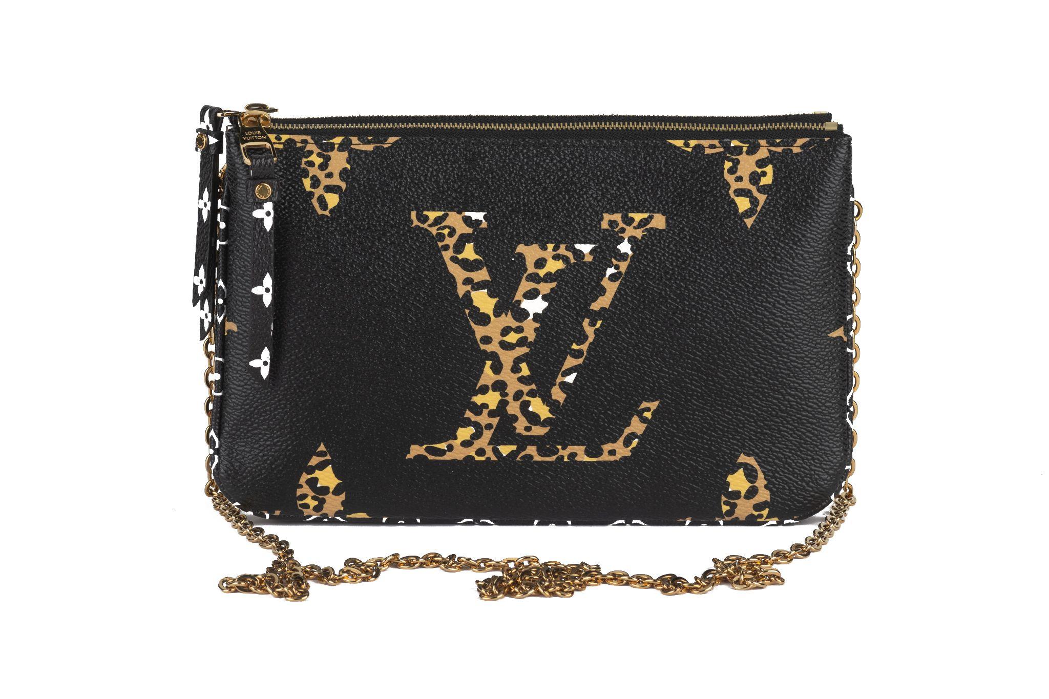 This Louis Vuitton Monogram Jungle Pochette Double Zip in Black. This clutch features the classic Louis Vuitton monogram on black and leopard-print coated canvas. The bag features black and white mini monogram canvas trim and a removable polished