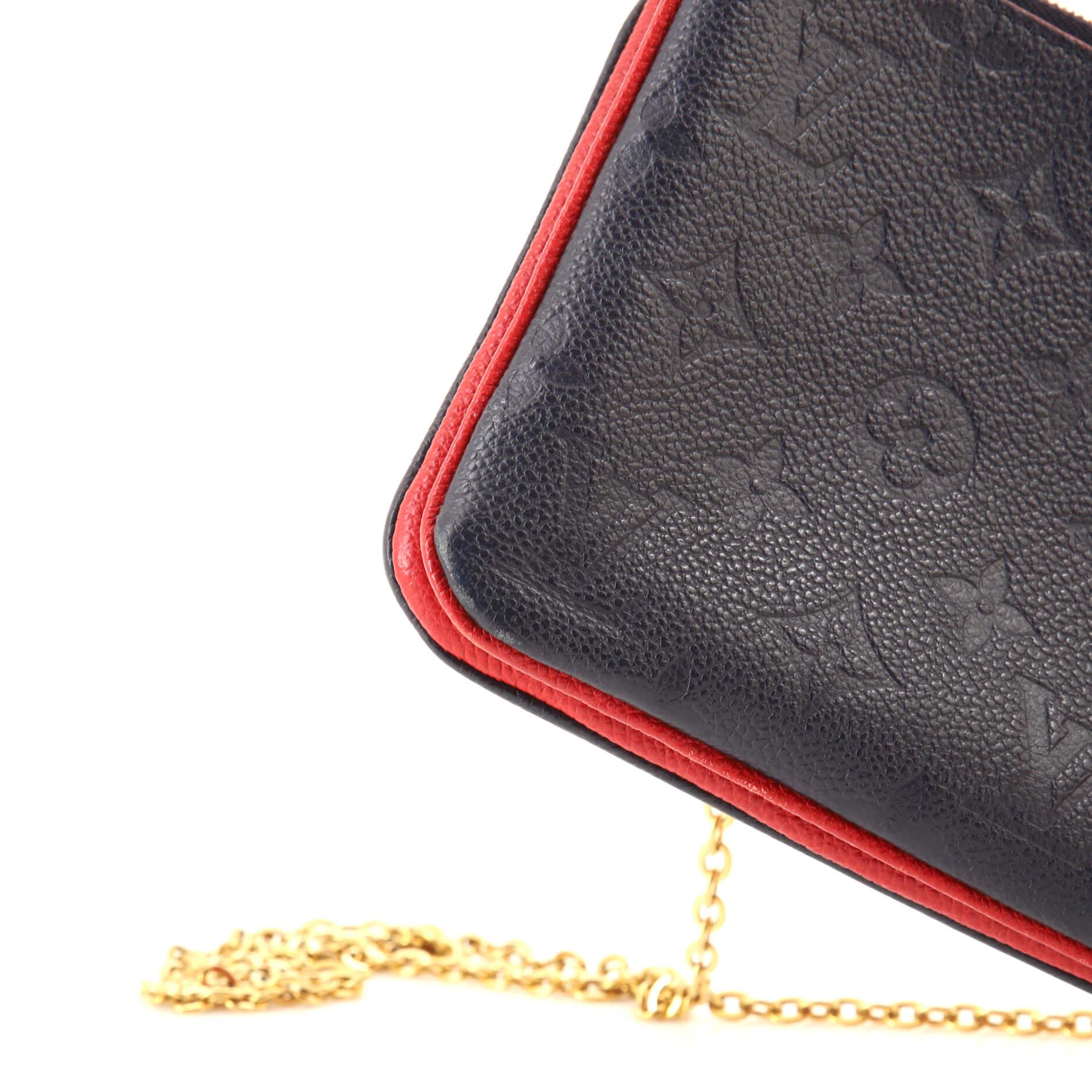 Louis Vuitton Double Zip Pochette Monogram Empreinte Leather In Good Condition In NY, NY