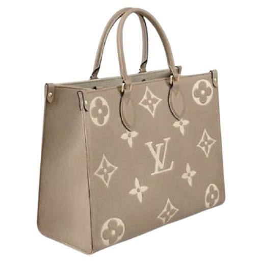 Louis Vuitton Dove Grey/Cream Embossed grained cowhide leather OnTheGo MM Bag