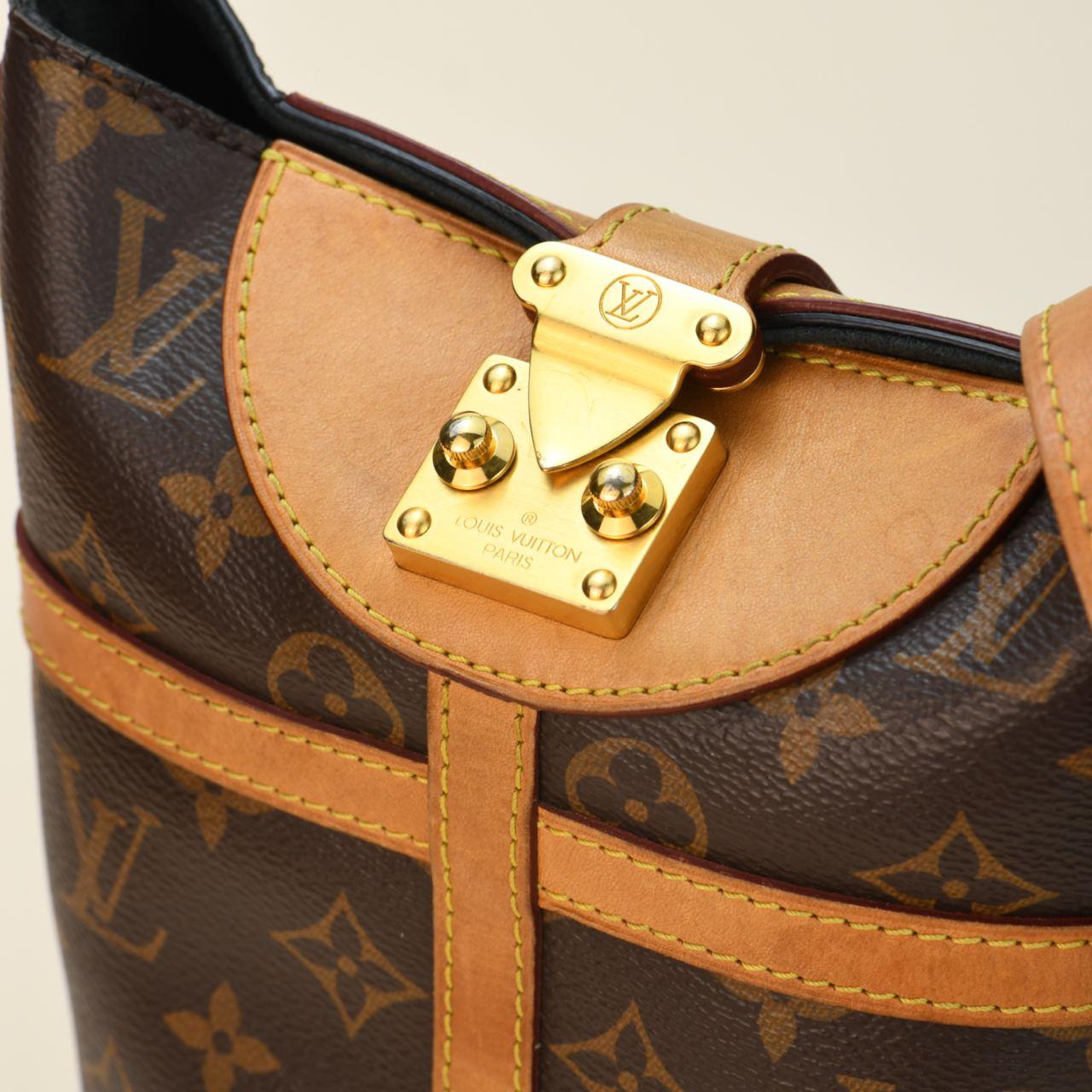 Sac à main Louis Vuitton Duffle Tops en toile monogrammée en vente 3