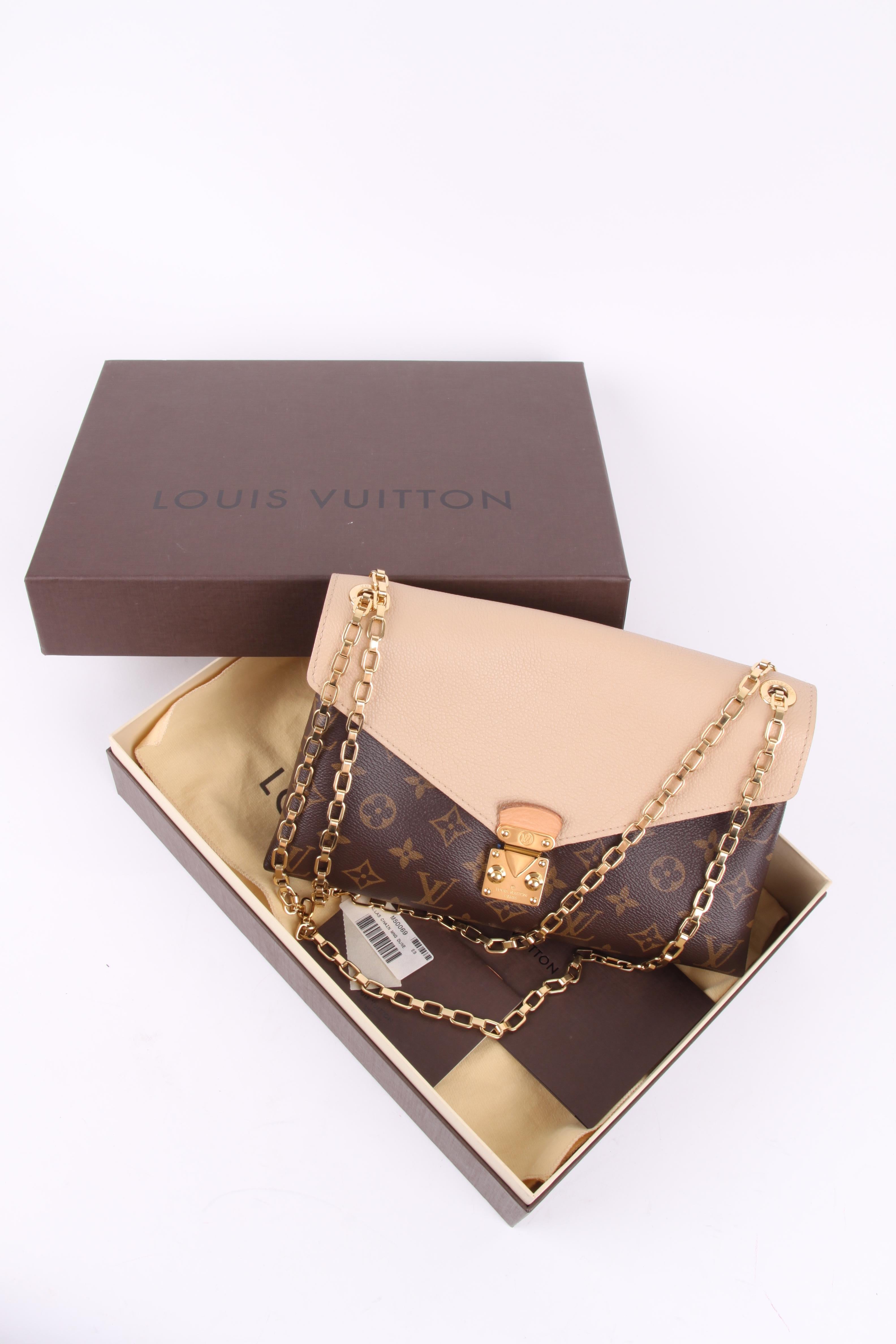 Louis Vuitton Dune Monogram Canvas Pallas Chain Bag.

This striking combination of Monogram canvas and a dash of modern color makes this Pallas wallet a must-have! Calf leather lining in Dune creates a luxuriously appealing wallet that opens with an