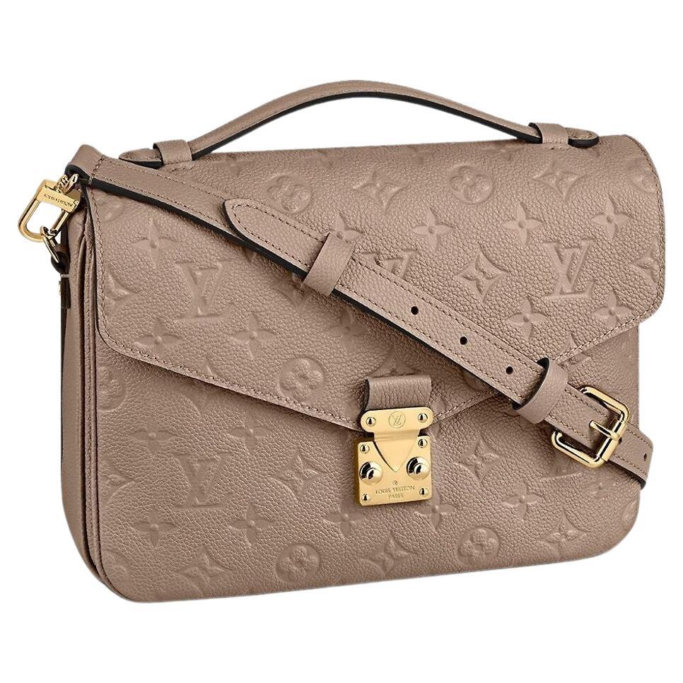 Louis Vuitton Dune Monogram Empreinte Leather Pochette Métis For Sale at  1stDibs