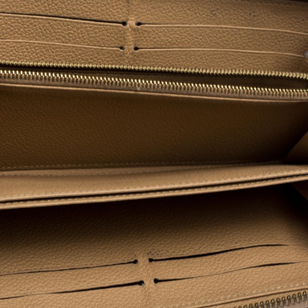 Louis Vuitton Dune Monogram Empreinte Leather Zippy Wallet In Good Condition In Dubai, Al Qouz 2