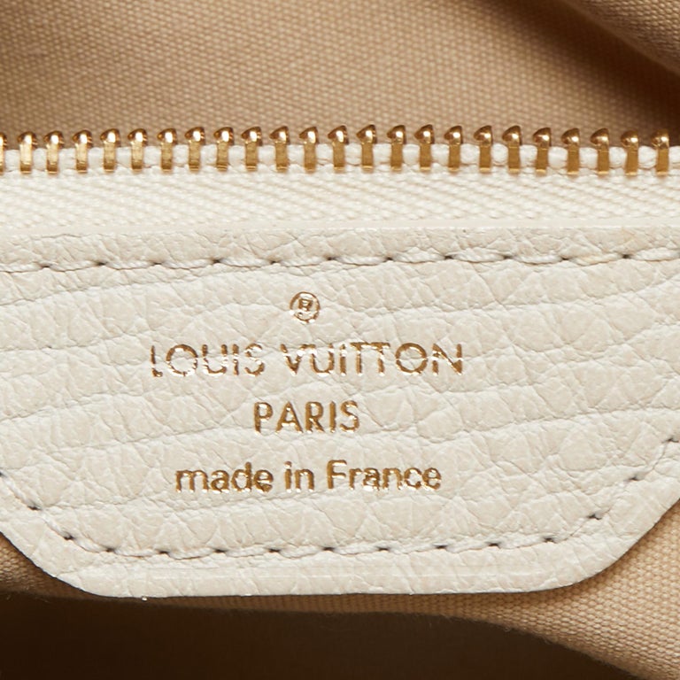 Louis Vuitton Louis Vuitton Bucket PM White Dune Mini Lin Monogram