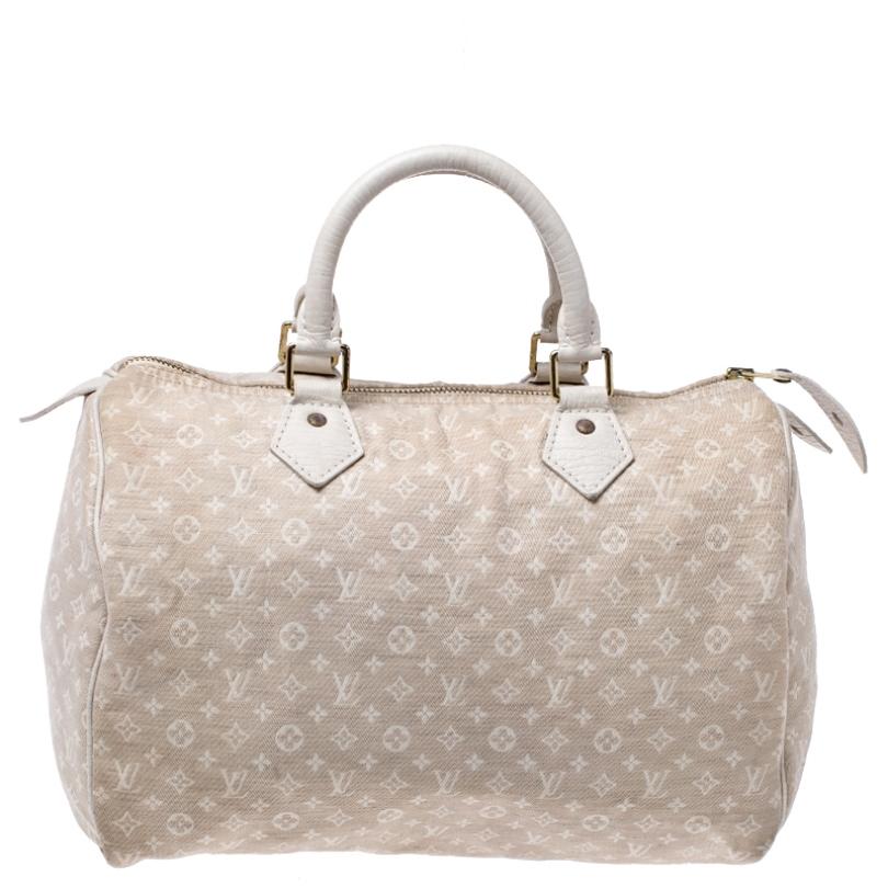 Titled as one of the greatest handbags in the history of luxury fashion, the Speedy from Louis Vuitton was first created for everyday use as a smaller version of their famous Keepall bag. This Speedy 30 comes in Monogram canvas with leather handles