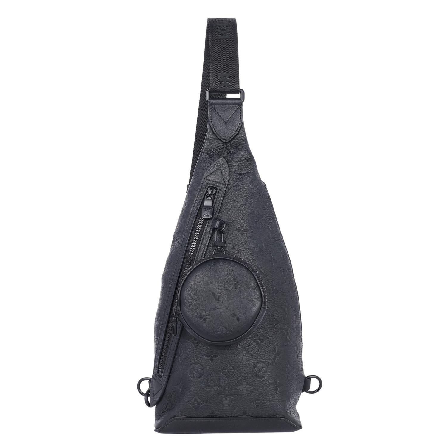 Authentic pre-loved Louis Vuitton Duo Slingbag Backpack in black. Features embossed black monogram leather, zipper closure, large deep interior, side zipper pocket, removable zipped pouch, adjustable strap on both sides, black hardware. This bag is