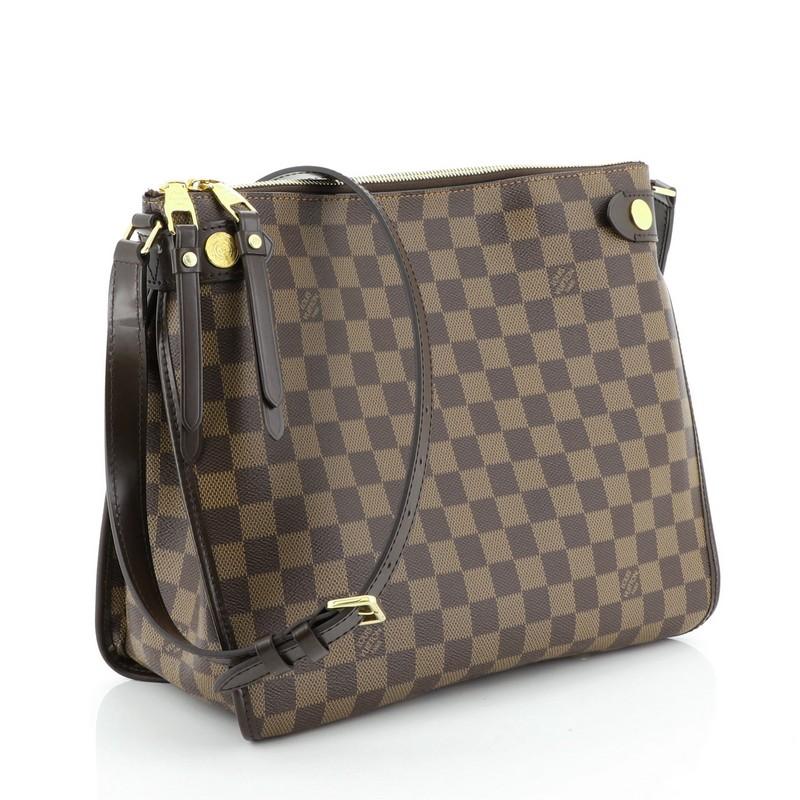 This Louis Vuitton Duomo Messenger Bag Damier, crafted in damier ebene coated canvas, features a leather shoulder strap, leather trim and gold-tone hardware. Its zip closure opens to a red fabric interior with slip pockets. Authenticity code reads: