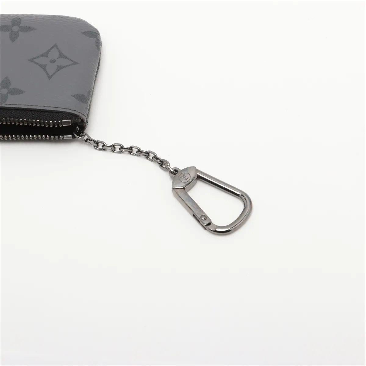 Porte-monnaie The Eclipse Pochette de Louis Vuitton Pour femmes en vente