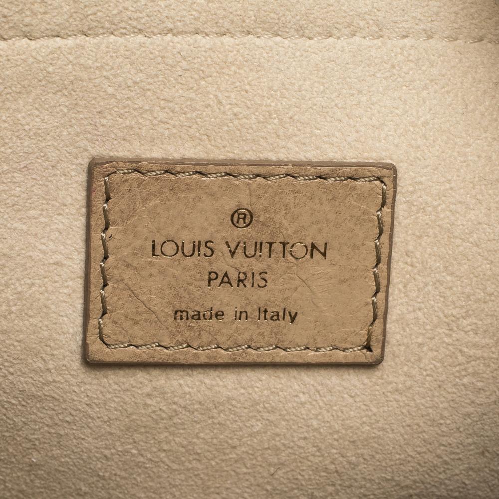 Louis Vuitton Ecru Monogram Leather Olympe Nimbus GM Bag In Good Condition In Dubai, Al Qouz 2