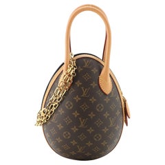 Louis Vuitton Eiertasche aus Segeltuch und Leder mit Monogramm