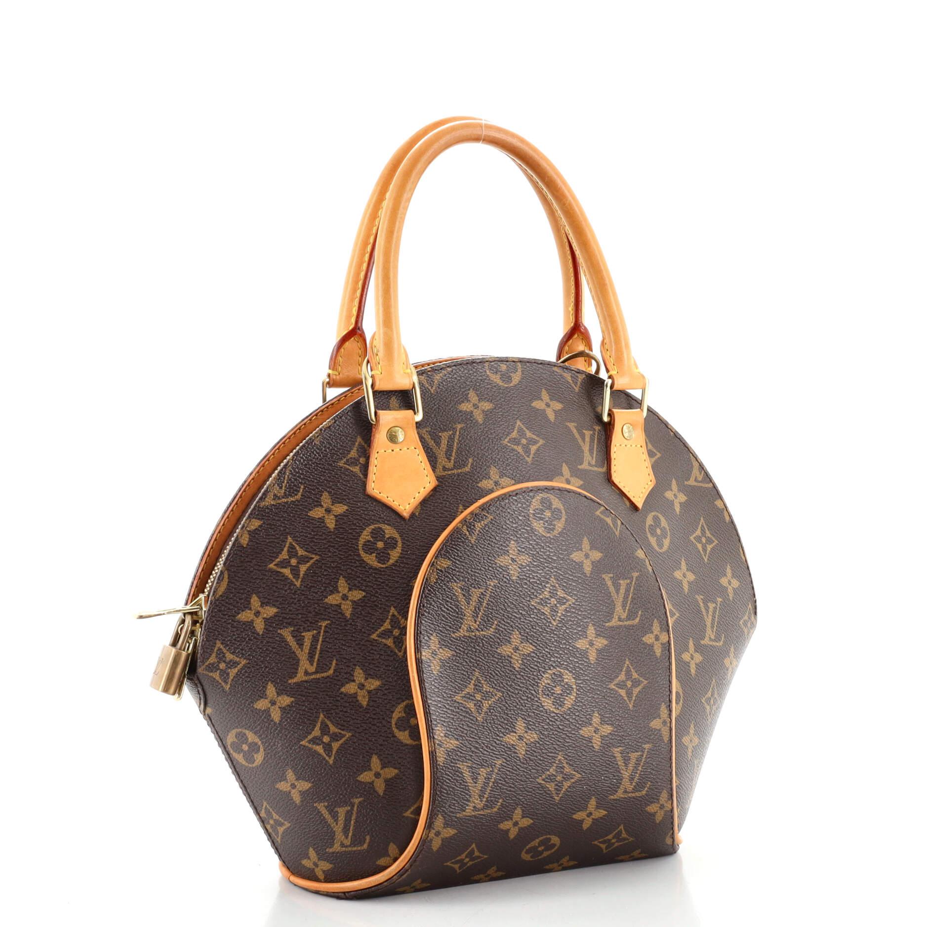 Condition: Good. Odor in interior. Moderate darkening, scuffs and watermarks on leather trims and handles, marks on exterior. Cracking on handles wax edges, fraying on handle base. Wear on exterior pipping and in interior, scratches and tarnish on