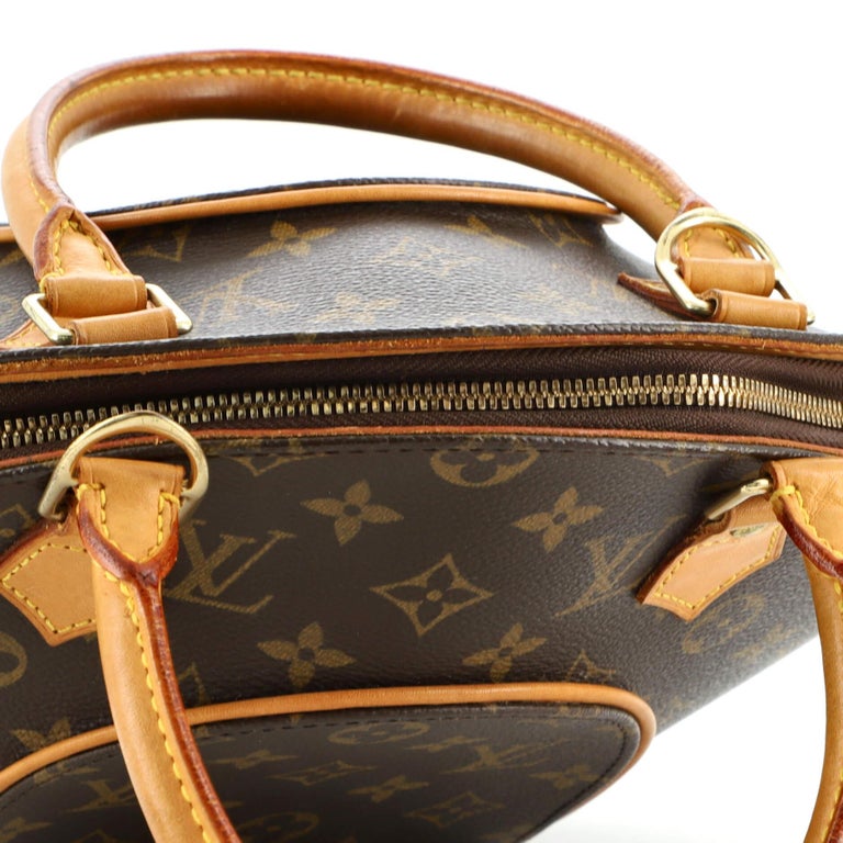 A Louis Vuitton monogram Ellipse pm handbag, with cow hide trim, with brass  hardware, padlock and