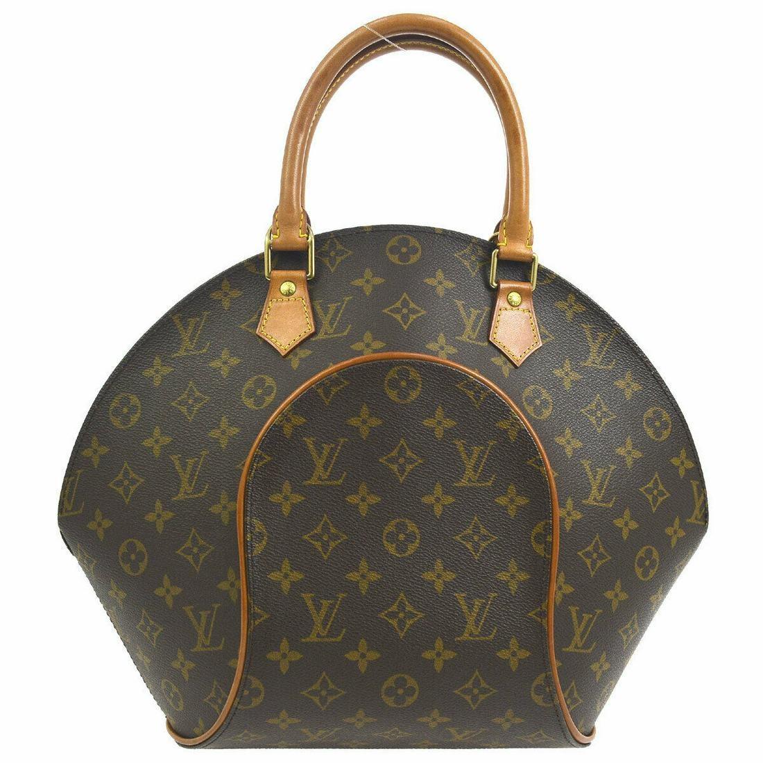 Vintage Louis Vuitton Ellipse MM Handbag in Monogram Canvas, France, February 2000 (MI0020). Handcrafted in France, this classic Ellipse bag has vachetta leather handles and piping as well as signature “LV” studs and hardware. Vachetta handles have