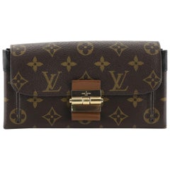 Louis Vuitton Elysee Wallet Monogram Canvas and Leather