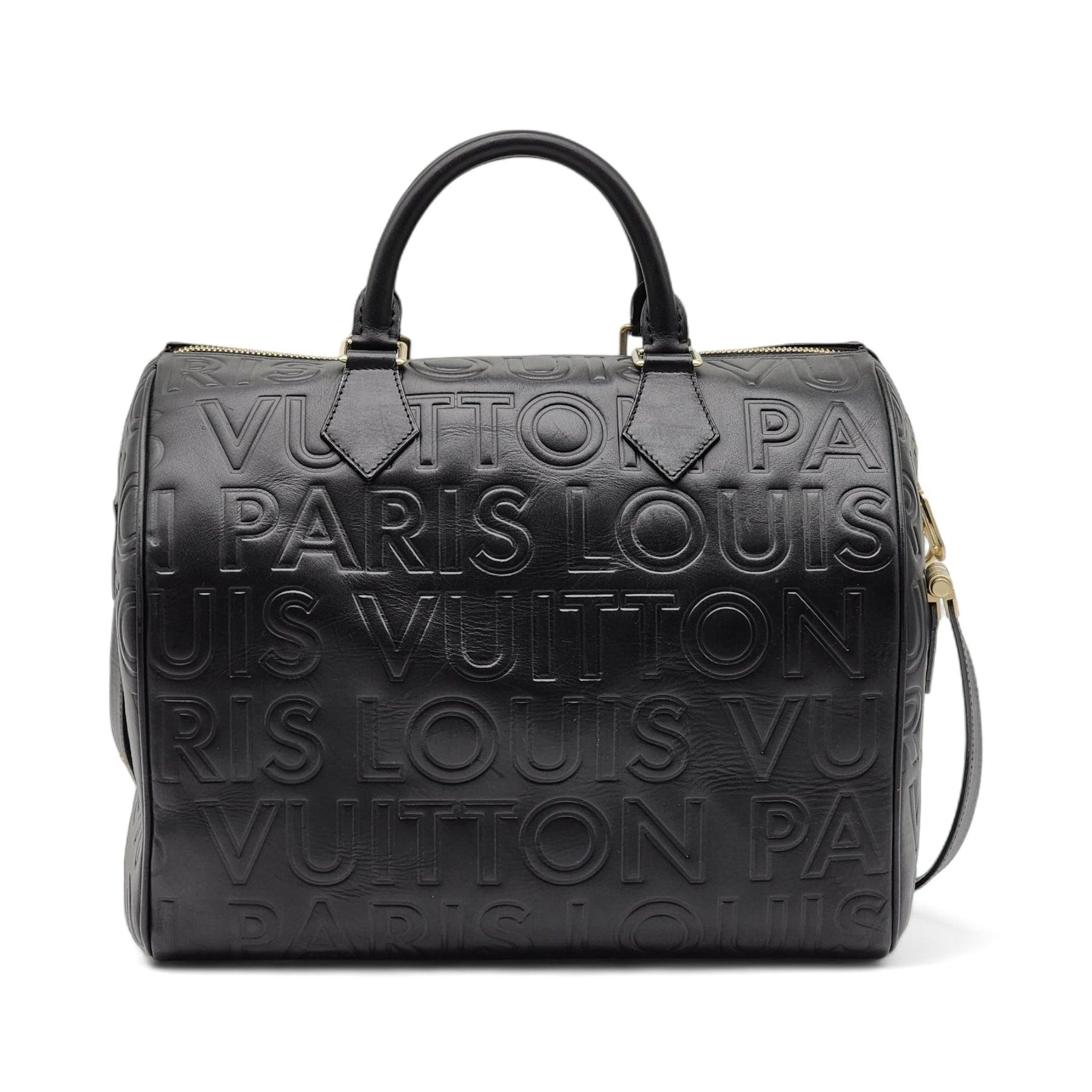 Louis Vuitton Embossed Leather Speedy Cube 30 Bag in Black.

Two Leather Top Handles; detachable shoulder strap Zip closure. Interior is fully lined and features a flat open. Gold-tone Hardware.

Additional information:
Material: Leather
Color: