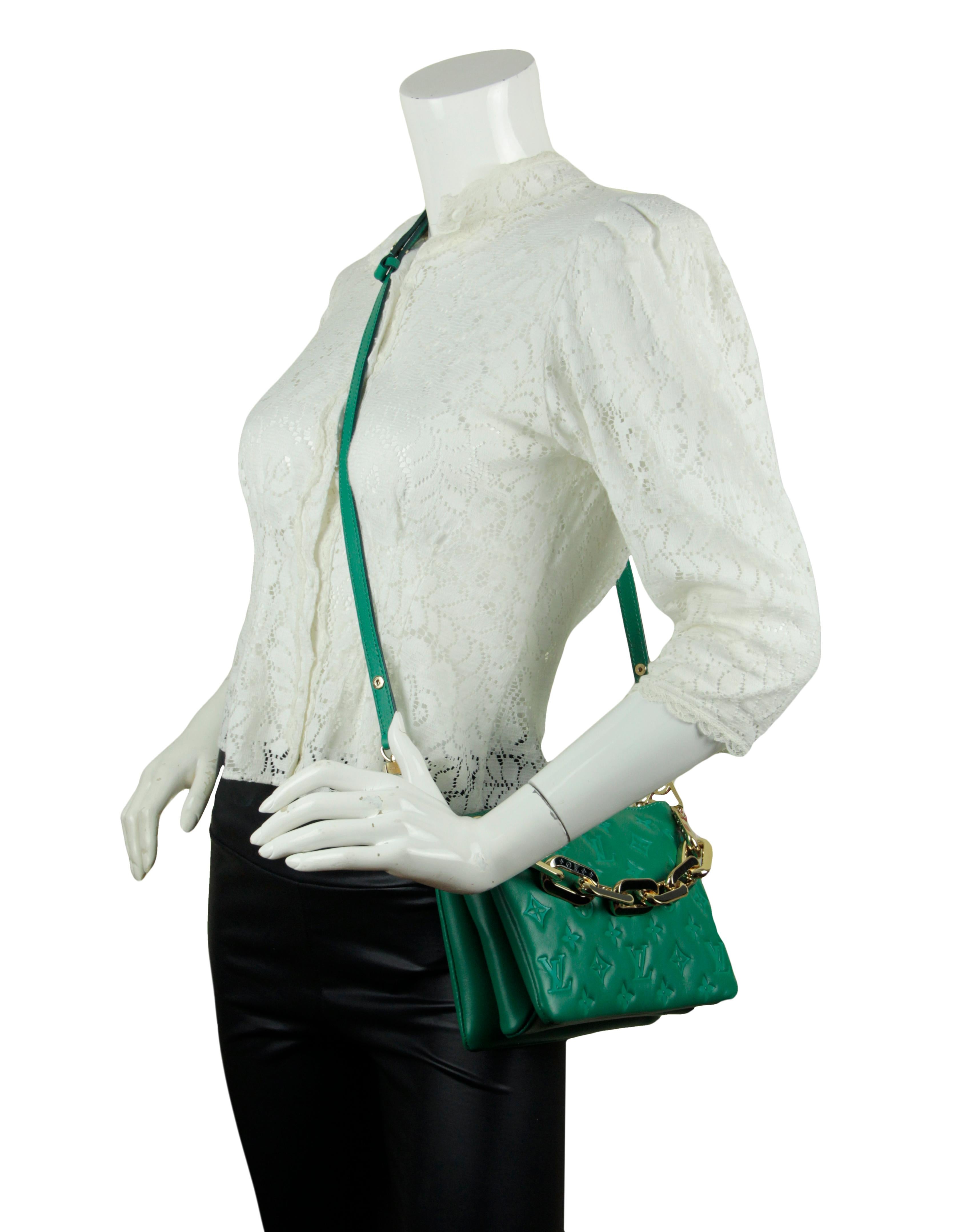 Louis Vuitton Emeraude Green Lambskin Embossed Monogram Coussin BB Bag.  Features adjustable canvas strap allowing for crossbody or shoulder carry, and chain strap for baguette and under-arm carry.

Made In: France
Year of Production: 2021
Color: