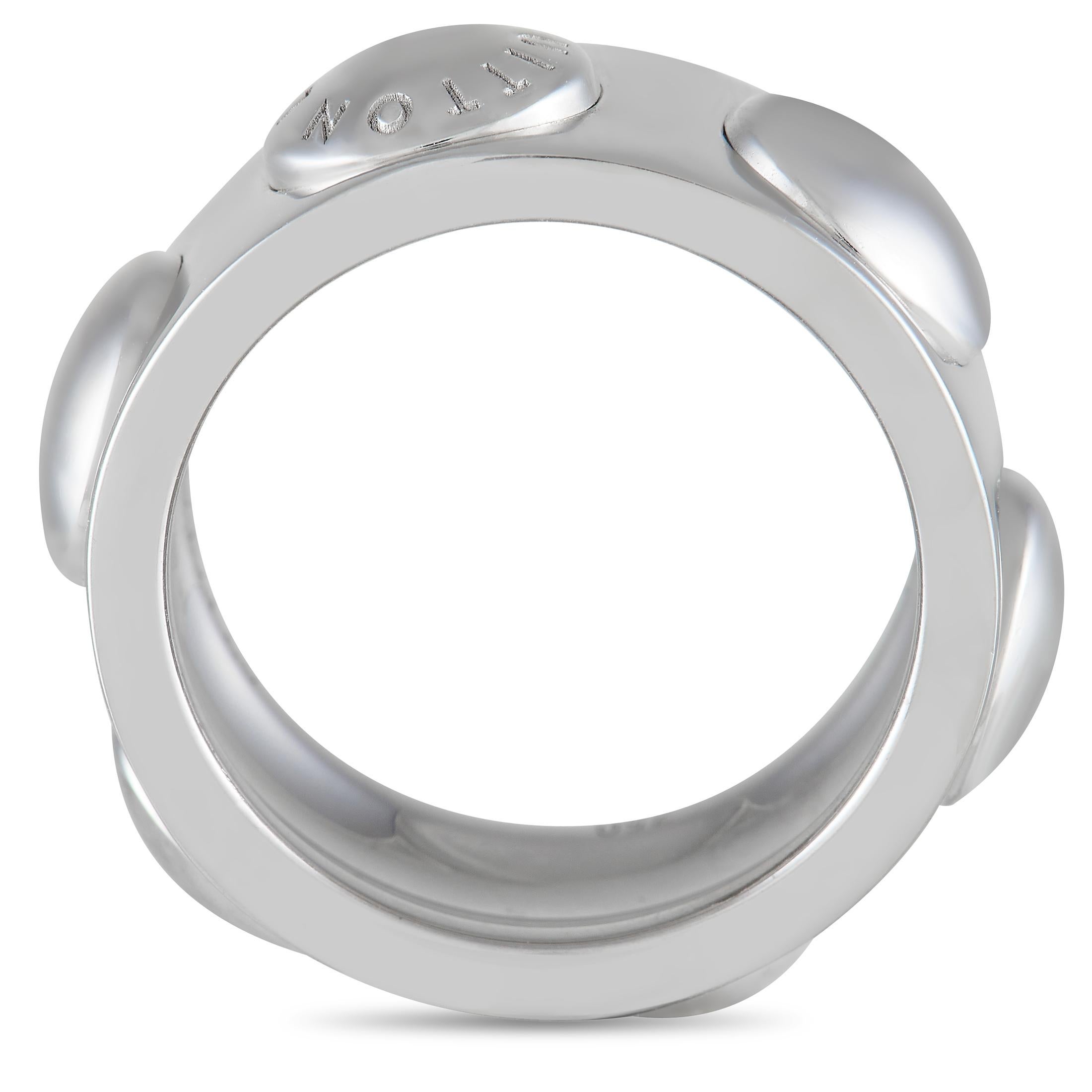 This Louis Vuitton ring is an easy way to add a touch of luxury to any ensemble. Simple and sophisticated, this 18K White Gold ring comes to life thanks to sleek rounded accents and the brand’s engraved moniker. Incredibly bold, it measures 10mm