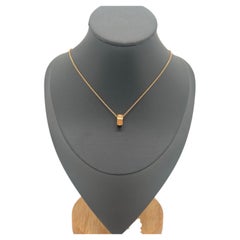 Louis Vuitton Empreinte 18k Yellow Gold Monogram Flower Cut-Out Pendant Necklace