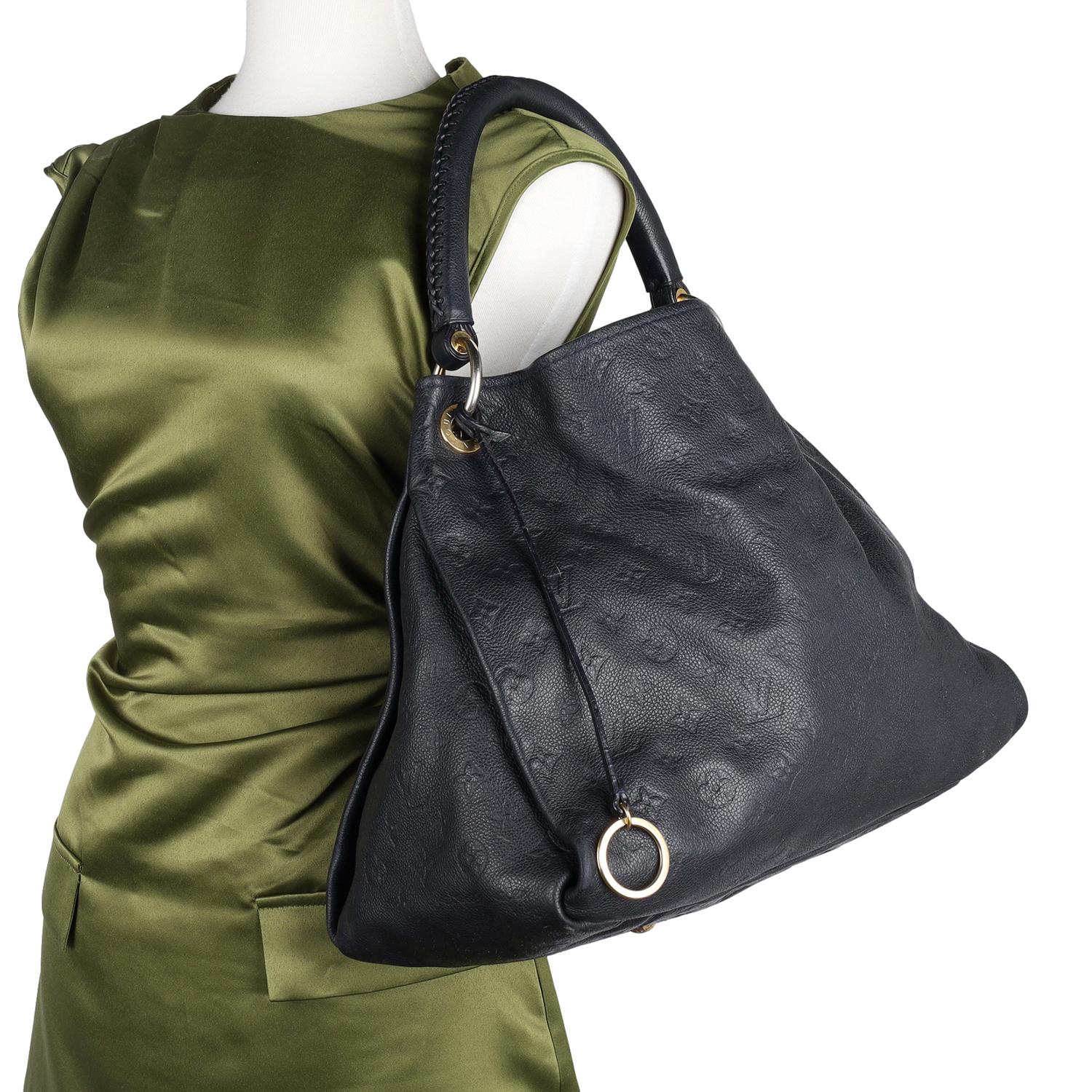 Authentic Louis Vuitton Artsy MM shoulder hobo bag in blue empriente leather. The Artsy MM handbag delights with its refined craftsmanship and functional features. Features supple Monogram Empreinte embossed leather, this luxurious hobo features a