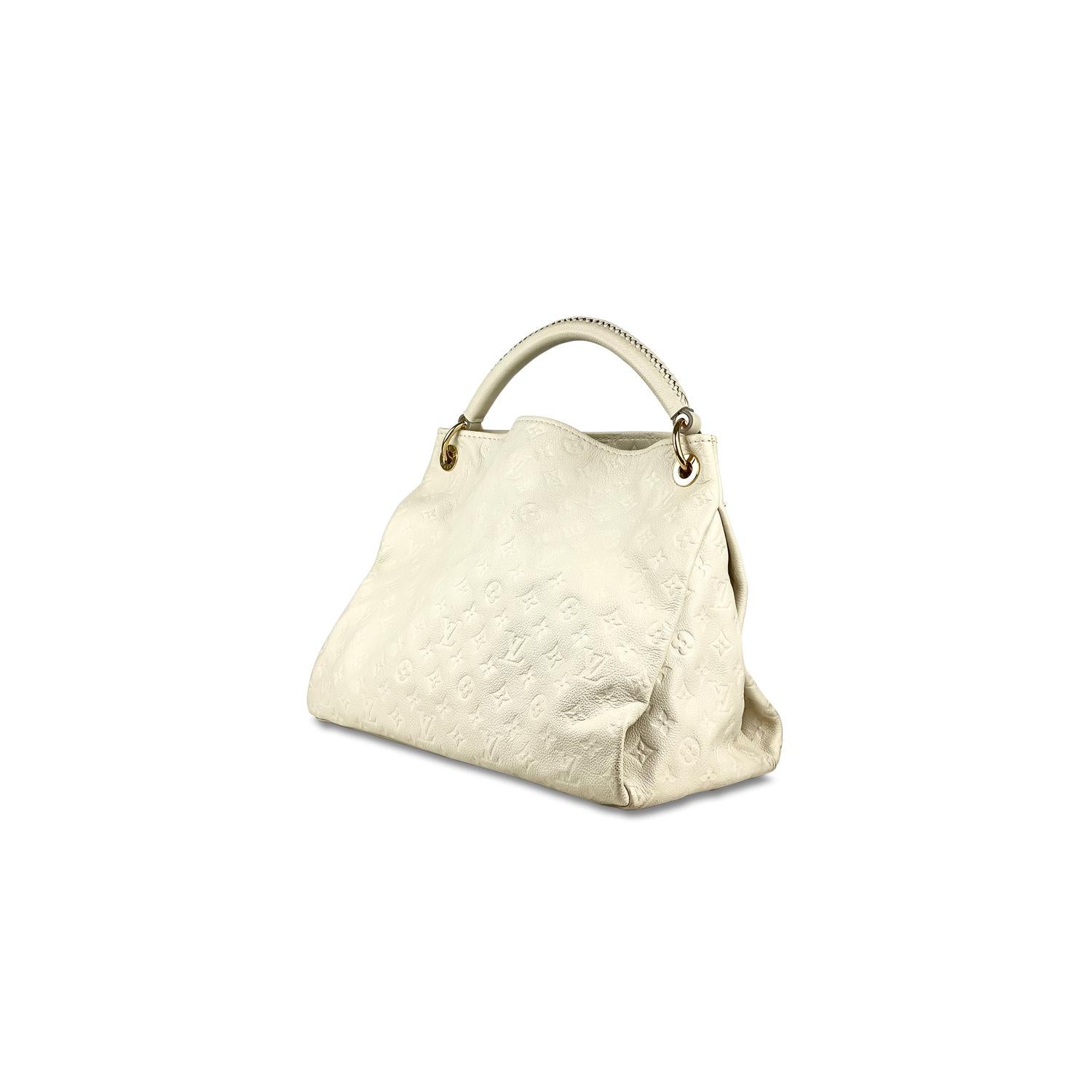 Neige Monogram Empreinte leather Louis Vuitton Artsy MM with

- Brass hardware
- Single rolled top handle
- Protective feet at base
- Ivory and black stripe canvas lining
- Seven interior pockets; one with zip closure and open top

Overall Preloved