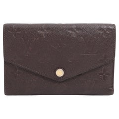 Louis Vuitton Empreinte Curieuse Trifold Geldbörse