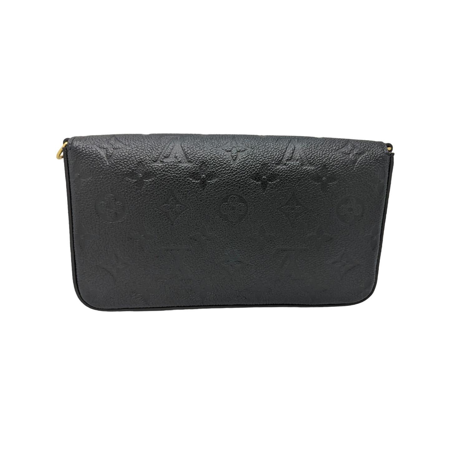 This chic clutch is crafted of black calfskin leather embossed with the Louis Vuitton monogram. The bag features an envelope-style front flap that unsnaps to a black fabric interior with a patch pocket.

Designer: Louis Vuitton
Material: Monogram