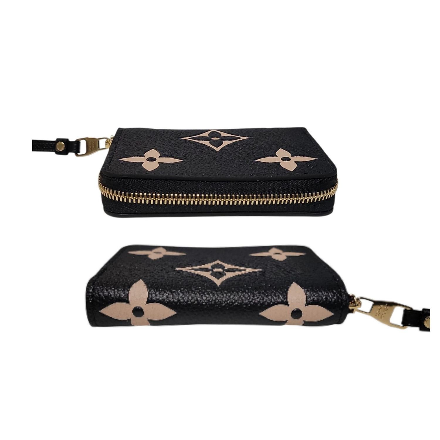 Portamonete Louis Vuitton Empreinte Monogram Giant Zippy in vendita 1