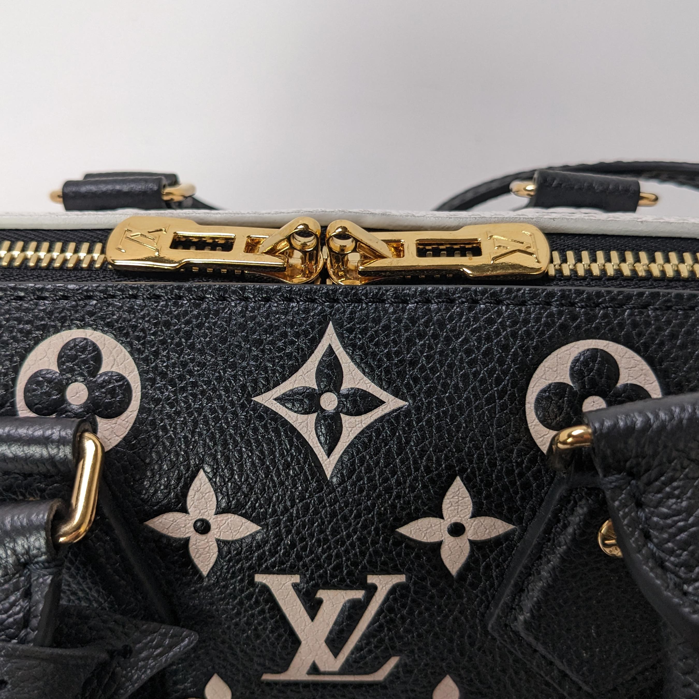 Condition: This authentic Louis Vuitton bag is in excellent pre-loved condition. There are scratches on the hardware and a tiny slit in the leather on the side of the bag.

Includes: Dust bag, box, ribbon, tag, keys, lock, charm

Features: It