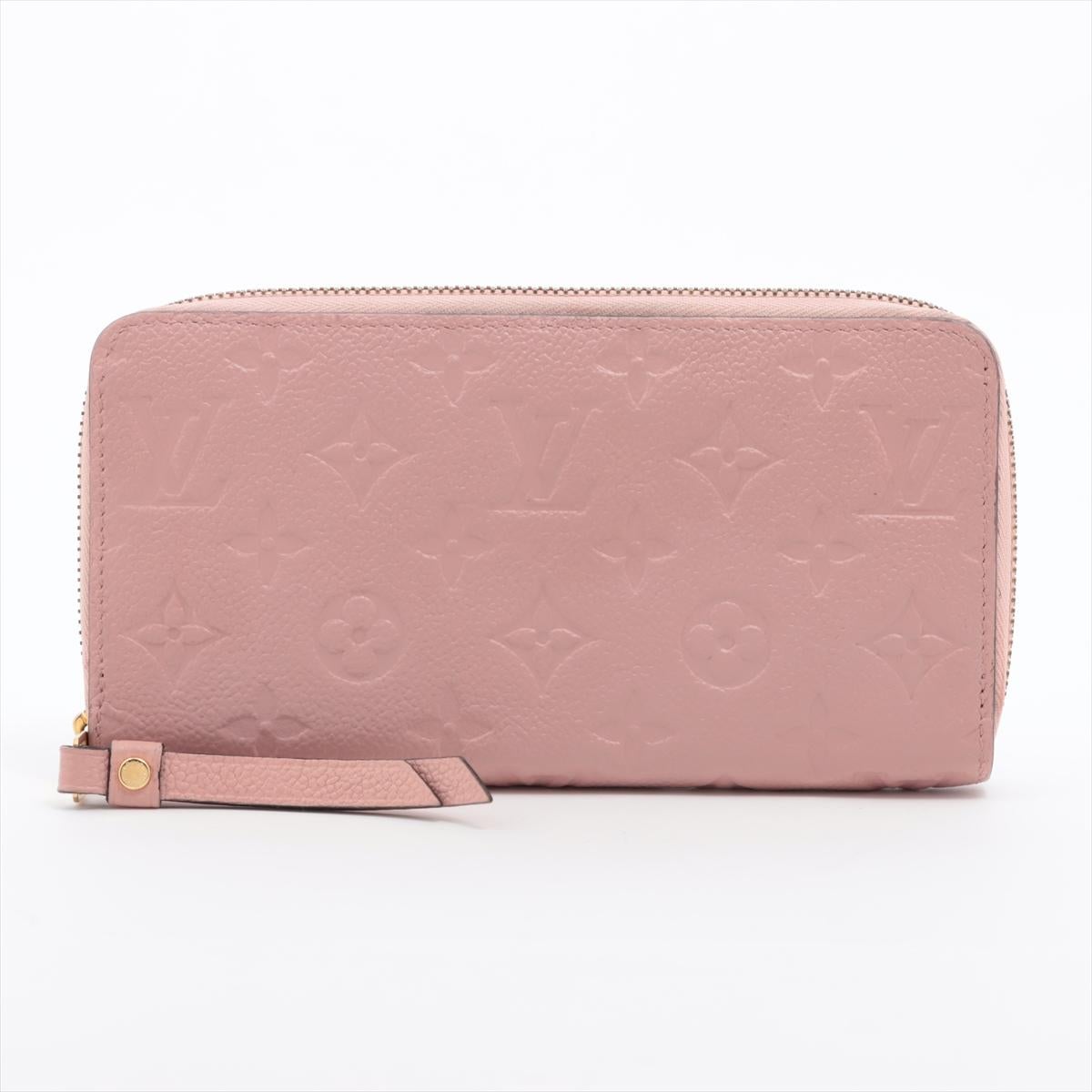 *ships about 12/11

The Louis Vuitton Empreinte Zippy Wallet in Rose Ballerine is a refined and elegant accessory crafted from soft Monogram-embossed leather in a delicate pink hue. Its zip-around design ensures secure storage, while the interior is