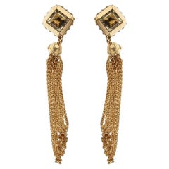 Pendientes con borlas de la colección Emprise de Louis Vuitton, en oro amarillo con cuarzo ahumado