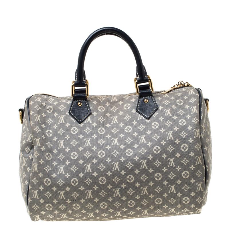 A traditional style that takes you back to the 1960’s, Speedy was one of the first bags made by Louis Vuitton for everyday use. Crafted from Encre Monogram Idylle, this Speedy Bandouliere features dual rolled handles, gold-tone hardware, and a