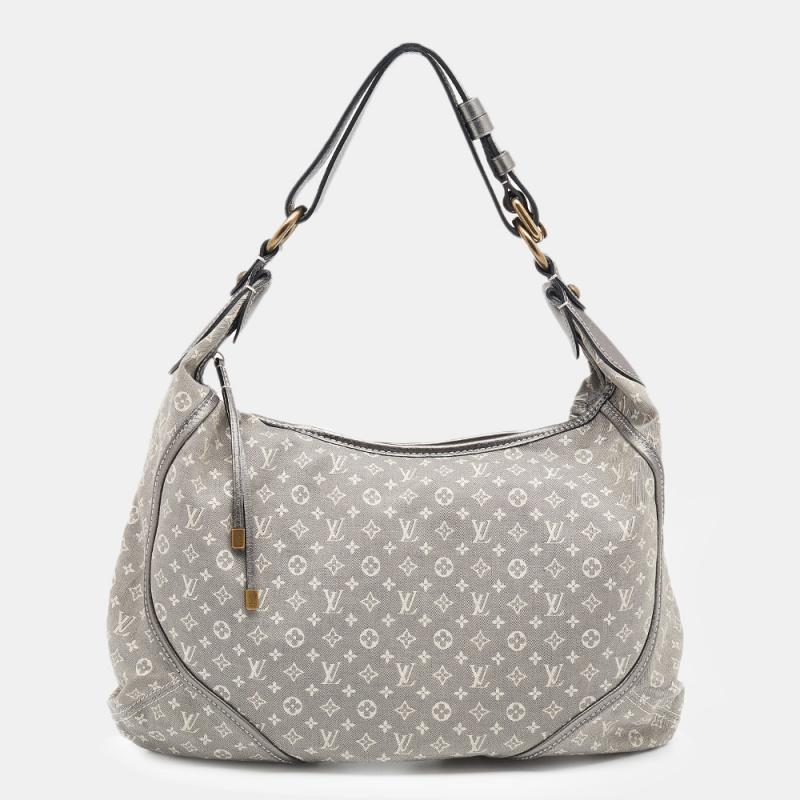 A favorite of style enthusiasts, this Louis Vuitton MM bag exemplifies durable construction and timeless elegance. The fabric-lined interior will store your essentials in style and the shoulder strap makes it easy to carry. Crafted from the