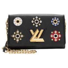 Louis Vuitton Epi Leather Mechanical Flowers Twist Chain Wallet