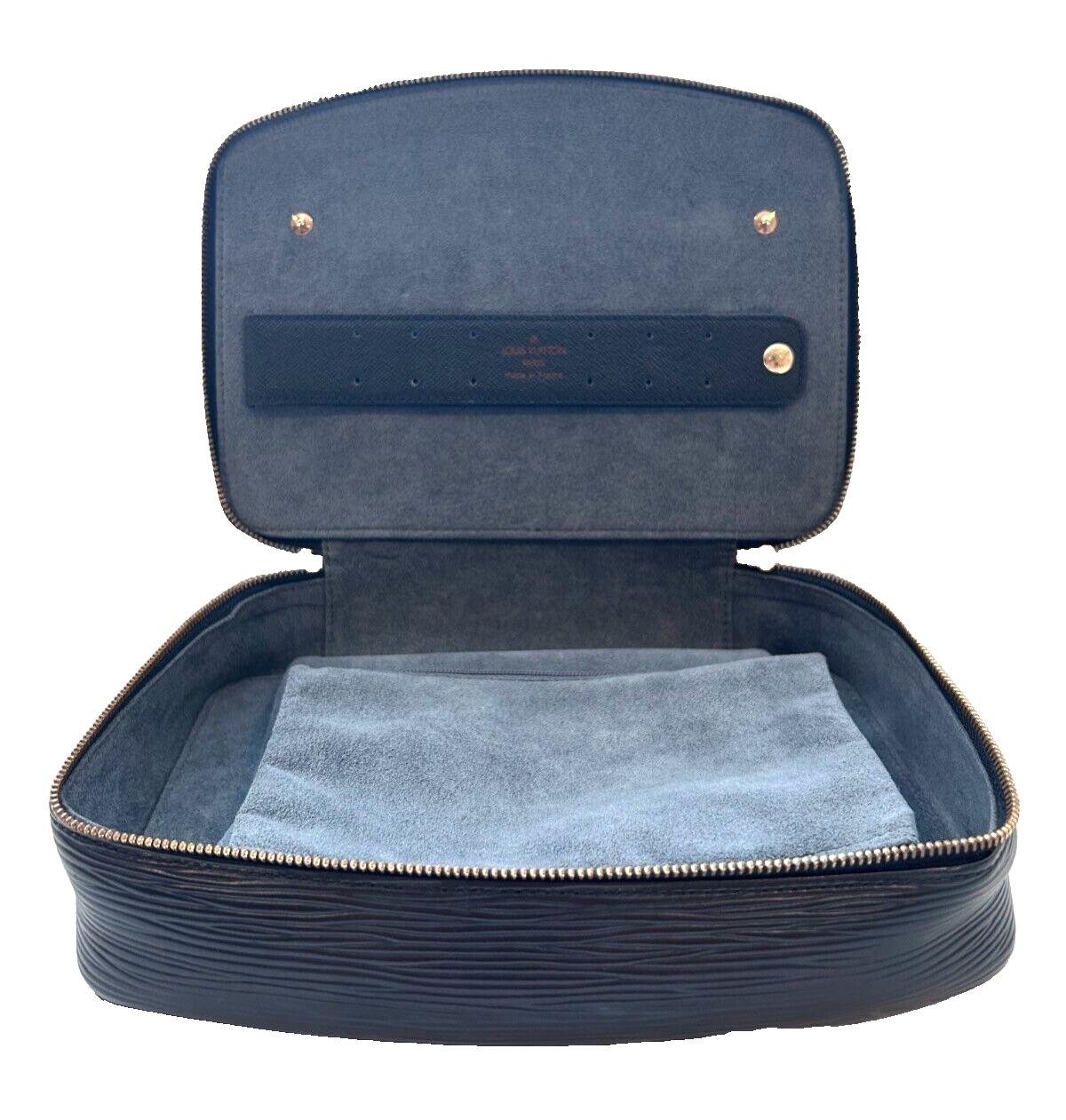 This is an authentic Louis Vuitton Epi Leather Noir Monte Carlo M48362 Jewelry Case. It is a rectangular shaped jewelry box made of high-quality black leather. The case is perfect for storing your favorite jewelry and keeps it safe from scratches