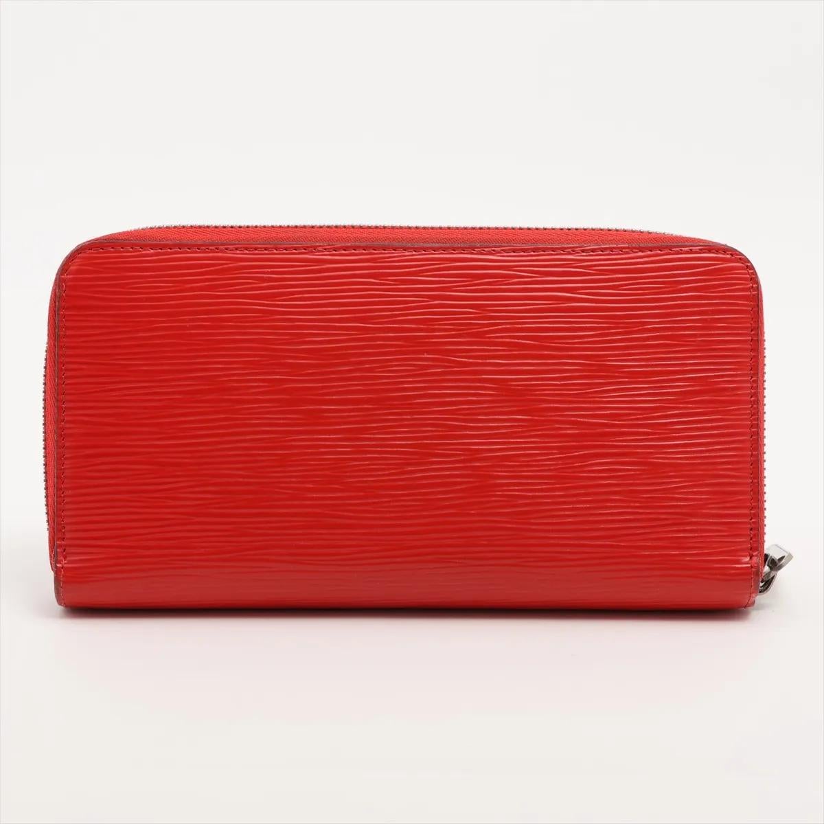 Rosso Portafoglio Louis Vuitton Epi Zippy Piment in vendita