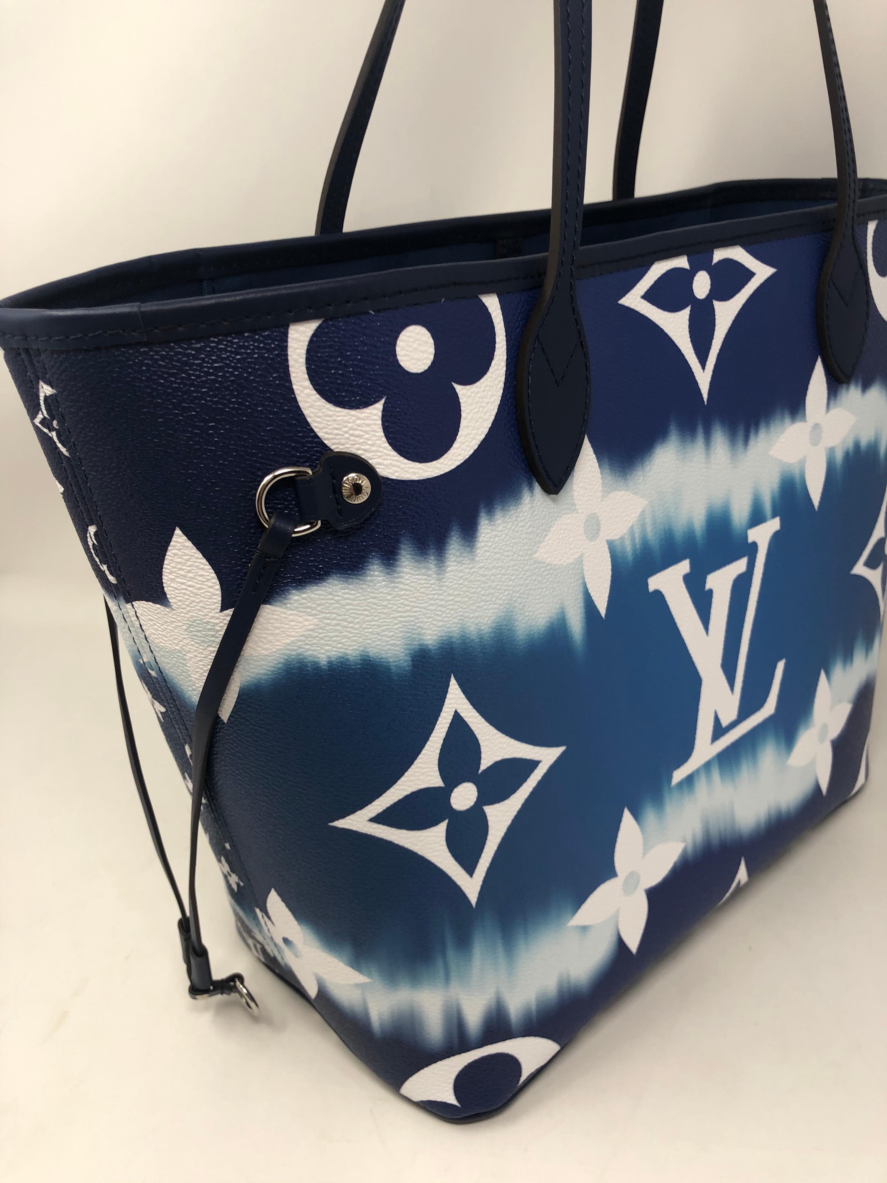 Louis Vuitton Monogram Escale MM Blue. Cool tye dye effect on tote. Unique look from LV. Limited and rare. Sold out at LV. Brand new with box. Guaranteed authentic. 