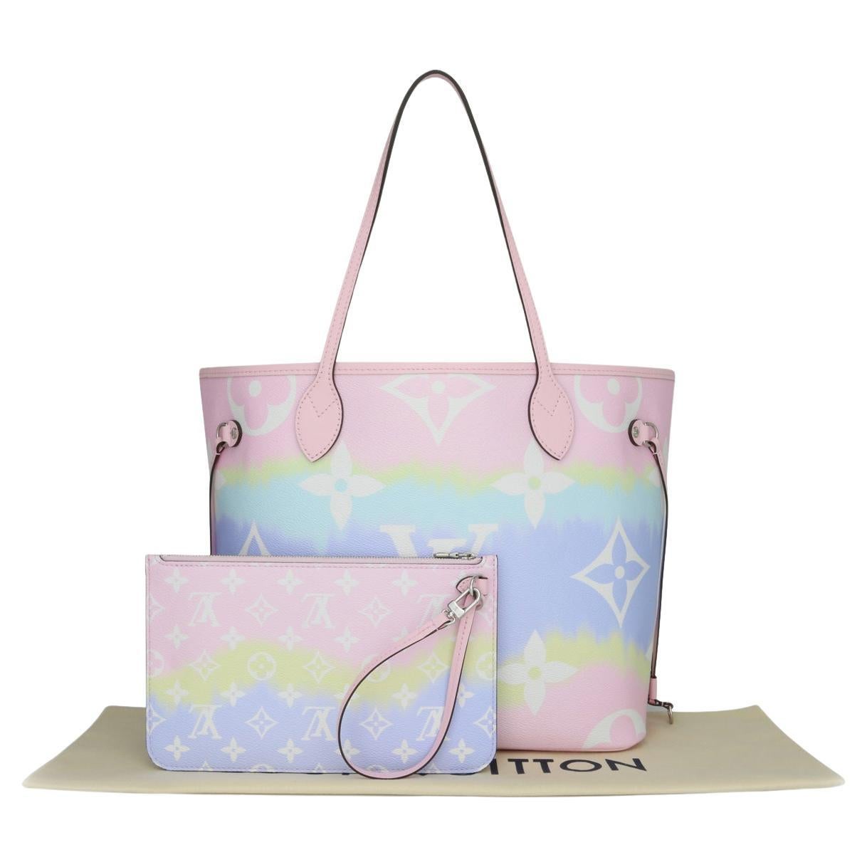 Louis Vuitton Escale Neverfull MM Bag in Pastel Rainbow with Periwinkle Interior with Silver-Tone Hardware 2020 Limited Edition.

This bag is in pristine condition.

Finding this particular style bag in excellent condition becomes extremely