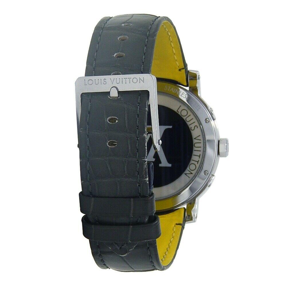Louis Vuitton Montre Escale Time Zone automatique en acier inoxydable pour hommes Q5D20 Excellent état - En vente à New York, NY