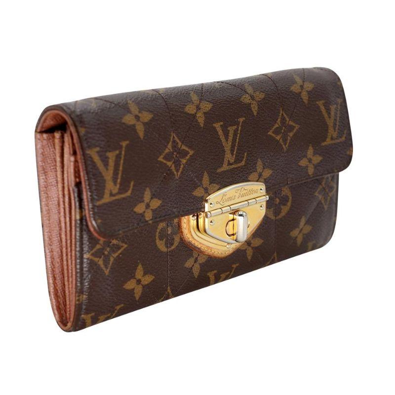 Louis Vuitton Etoile GM Quilted Long Wallet LV-1201P-0007

Louis Vuitton Signature Etoile Portefeiulle quilted monogram wallet with a big gold lock on the front super chic. This wallet is in pre-loved condition with basic wear there is some scuffs