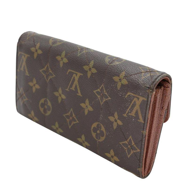 Louis Vuitton Etoile GM Quilted Monogram Wallet LV-W0128P-0004

Louis Vuitton Signature Etoile Portefeiulle quilted monogram wallet with a big gold lock on the front super chic. The wallet is super roomy and perfect for daily use and match any bag