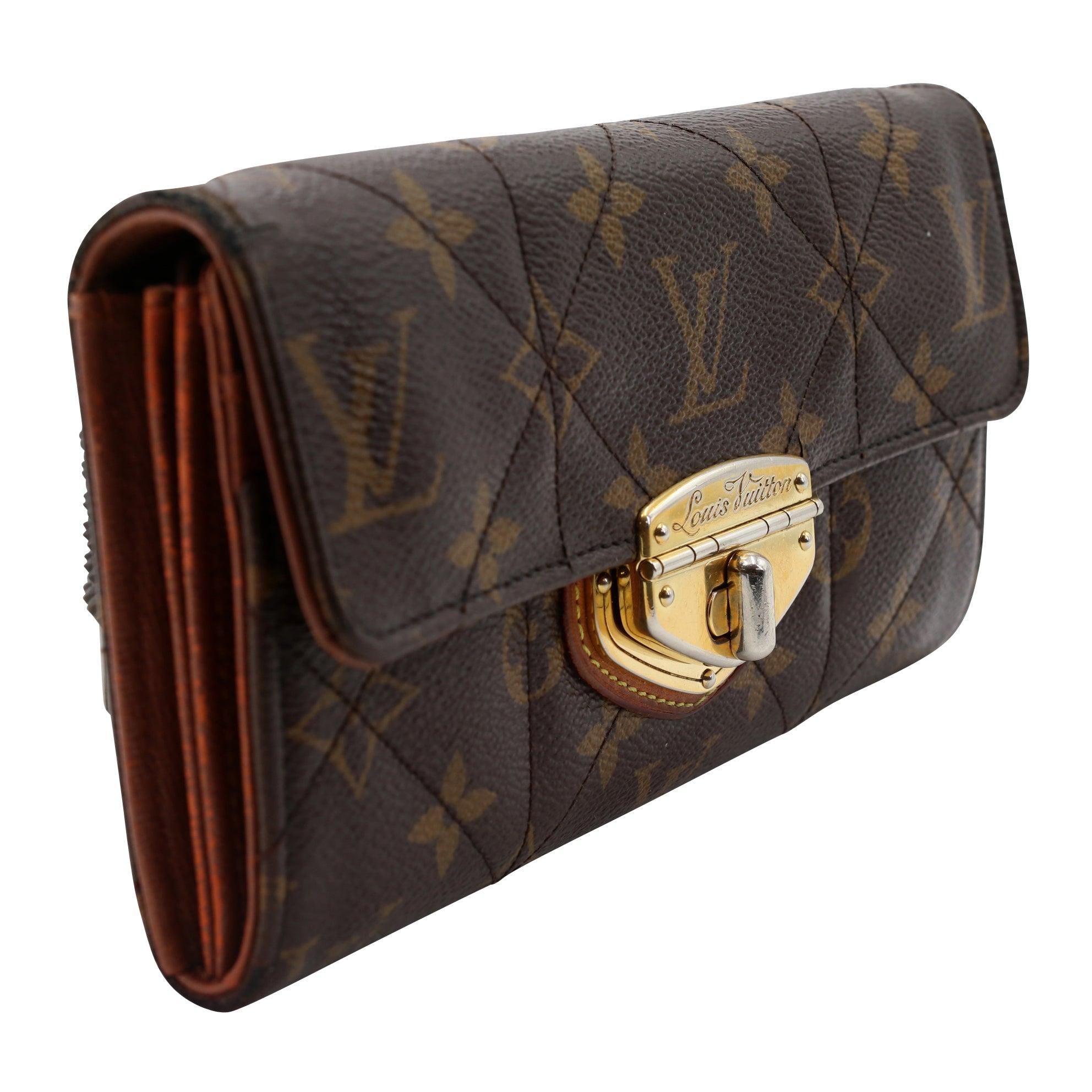 The Louis Vuitton Etoile wallet is perfect if you're seeking something sleek and compact with elegant gold detail. With many credit card slots and bill compartment, it will be the only wallet you will want to take with you everywhere. The exterior