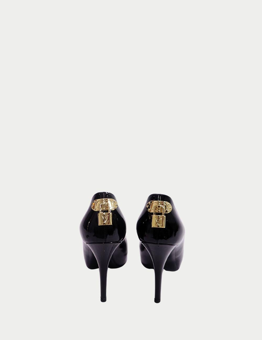 Step into timeless sophistication with these Louis Vuitton Black Patent Leather Peep-Toe Pumps. Crafted in glossy patent leather, these heels feature a sleek silhouette with a flattering peep-toe design, adding the perfect touch of allure to both