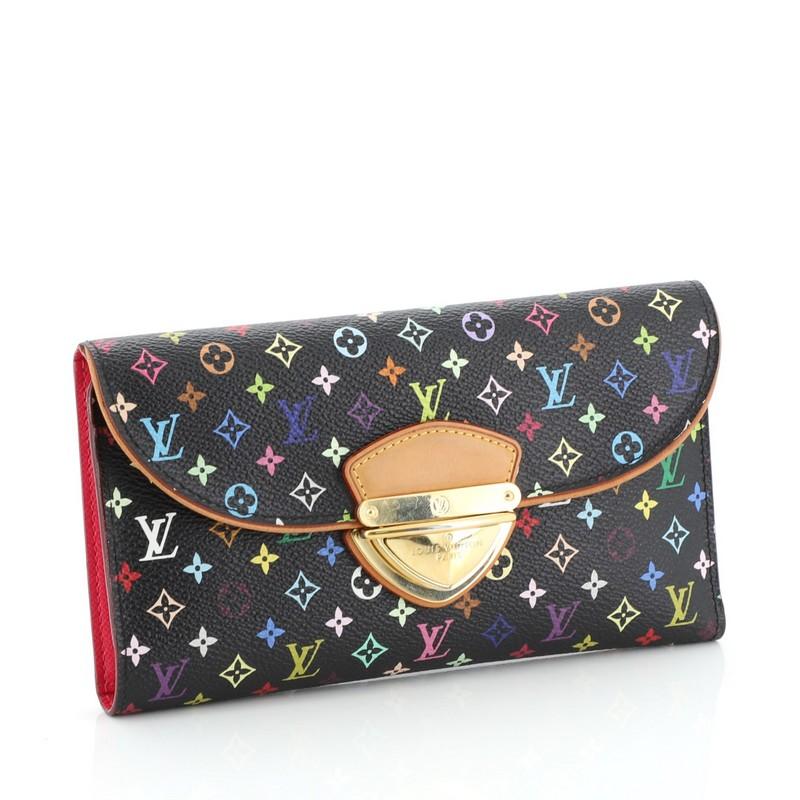 This Louis Vuitton Eugenie Wallet Monogram Multicolor, crafted from black monogram multicolor coated canvas, features top flap, exterior back zip pocket, and gold-tone hardware. Its push-lock closure opens to a pink leather interior with multiple