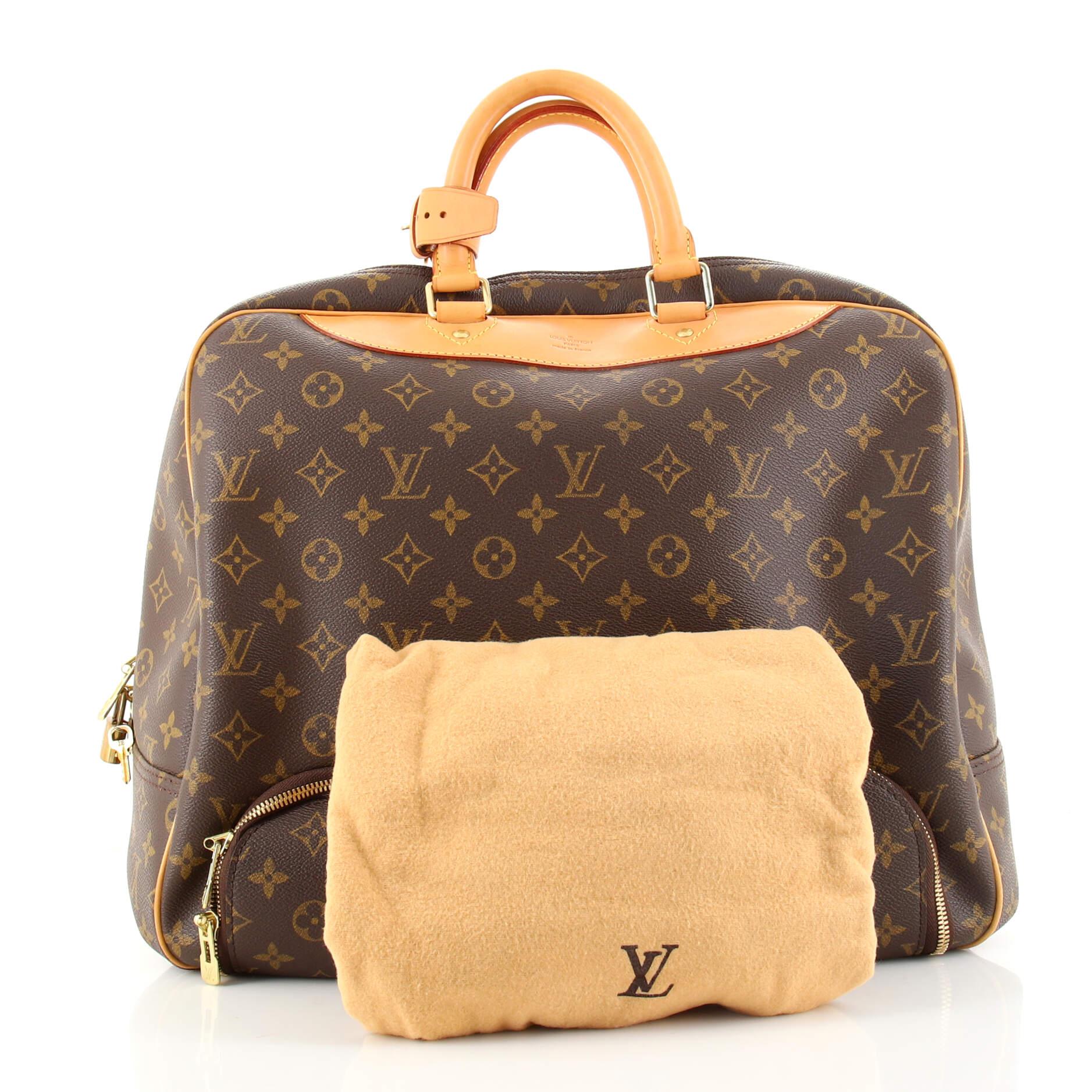 Condition: Very good. Odor in interior. Creasing on exterior, darkening, wear, scuffs and watermarks on leather trims and handles. Small marks in interior, scratches and tarnish on hardware.
Accessories: Dust Bag, Keys, Lock, Poignet
Measurements: