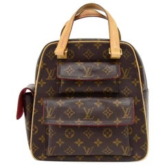 Louis Vuitton Excentri Cite Monogram Canvas Hand Bag