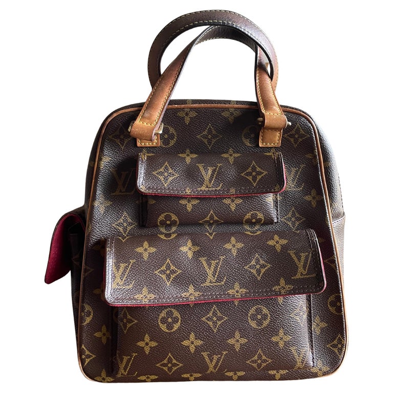 At Auction: Louis Vuitton, LOUIS VUITTON EXCENTRI-CITE HANDBAG